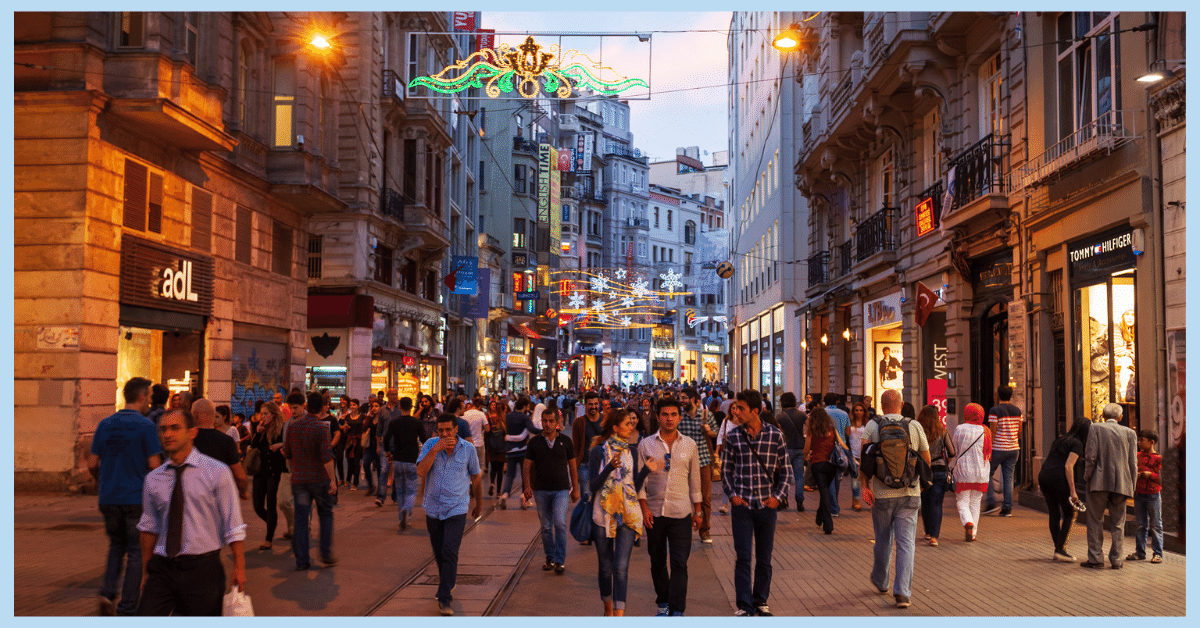 people strolling along a busy street in Turkey