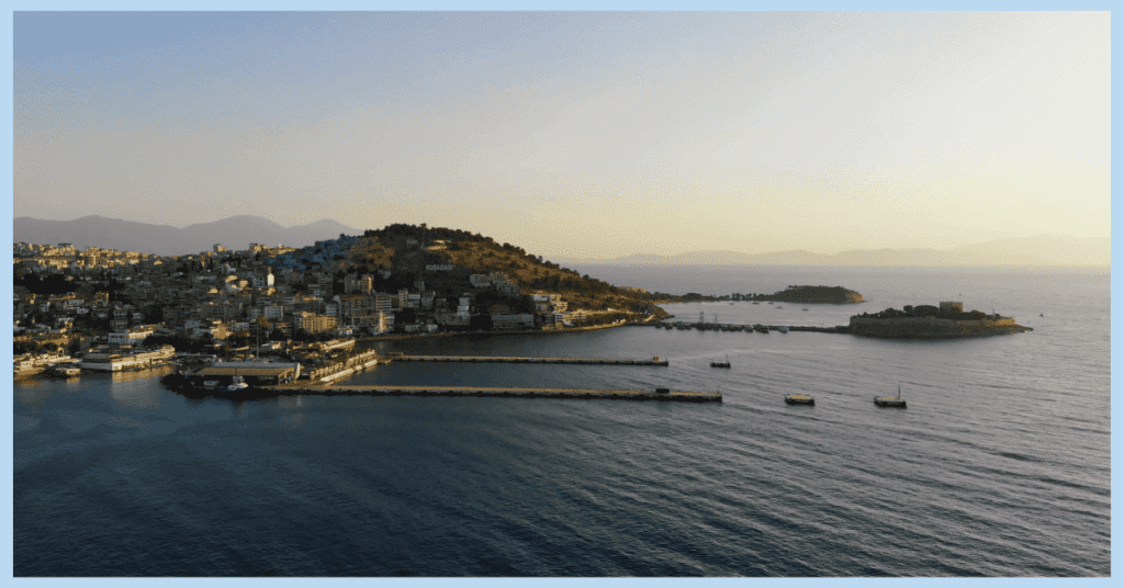 a view of the city of kusadasi in turkey at sunrise