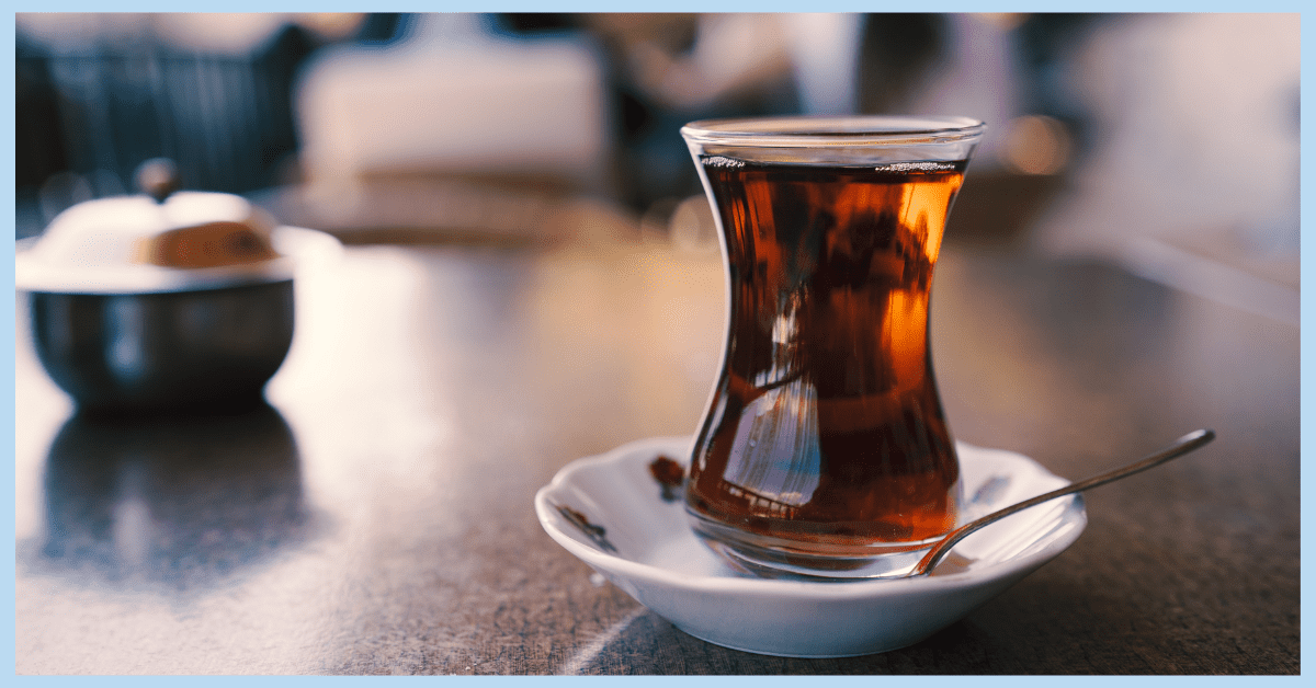 a tulip shaped glass of hot delicious turkish tea
