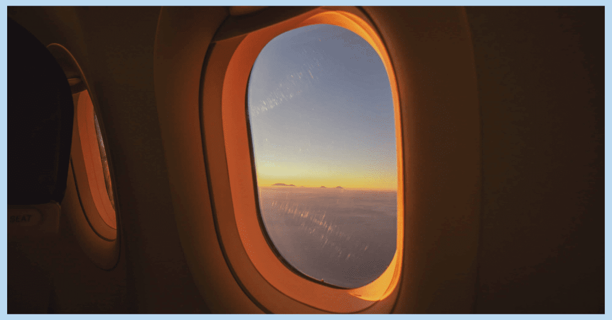 the view of the sky from the inside of a turkish airlines flight